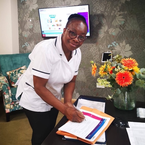 Abimbola working as a Healthcare Assistant